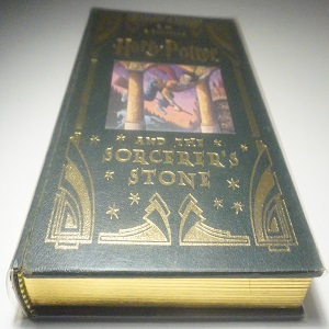 Collector's Item J.K Rowling Harry Potter and the Sorcerer's Stone, a novel publisher Scholastic Harry is rescued from the outrageous neglect of his auntand uncle